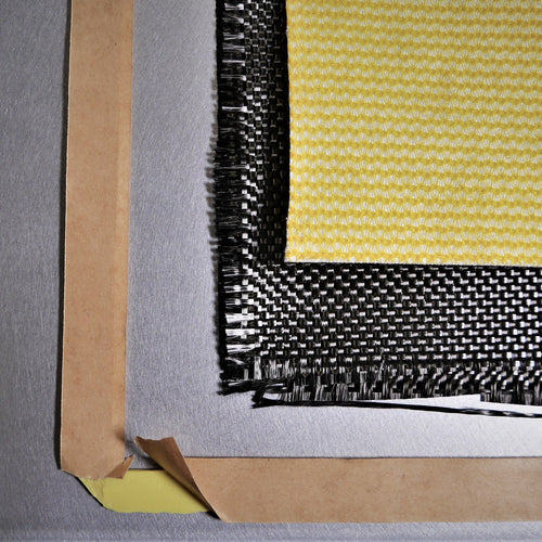 layered carbon fiber pieces