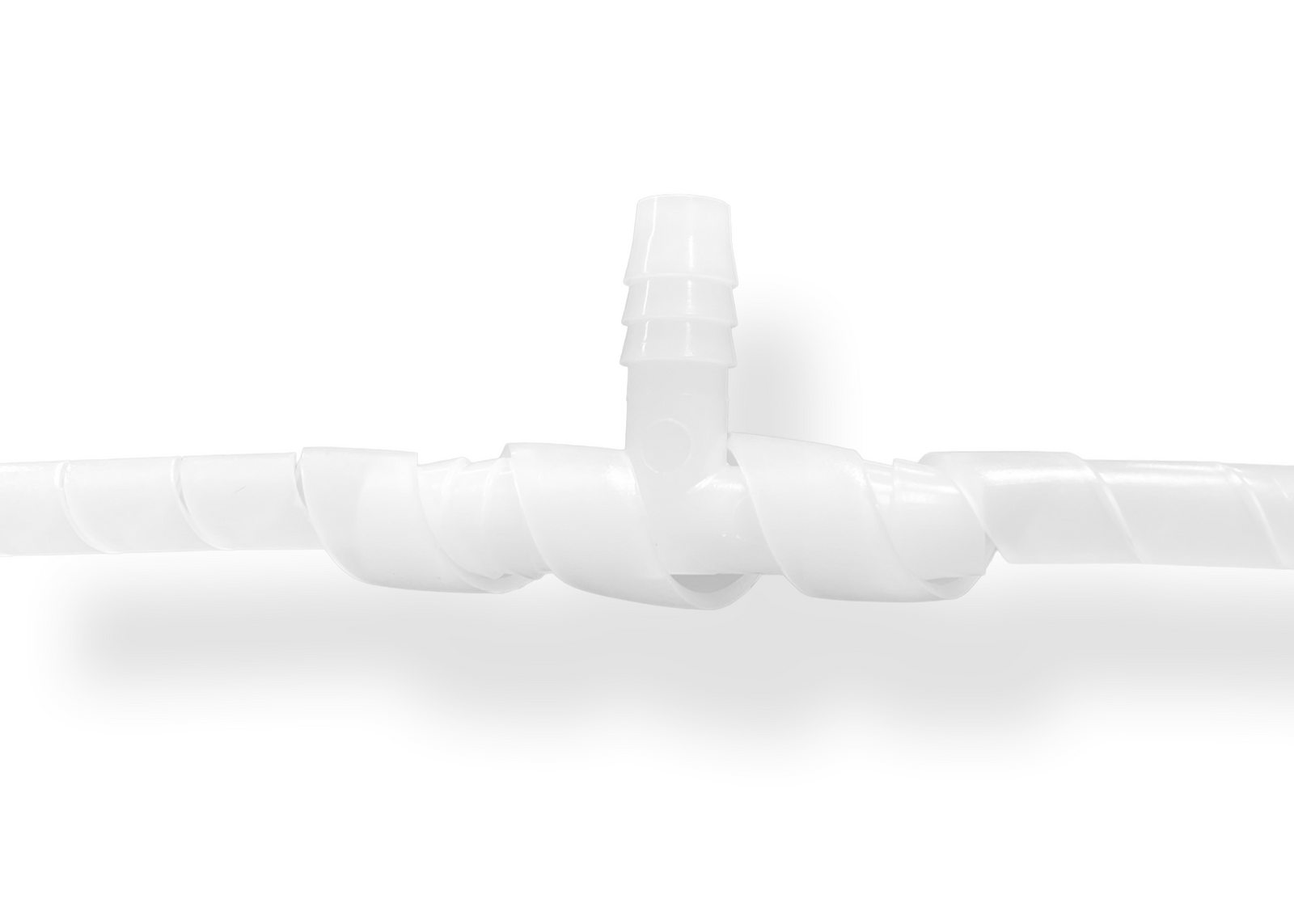 Quarter inch spiral tubing wrapped around a barbed tee fitting