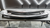 a carbon fiber finished rear spoiler sitting on a table
