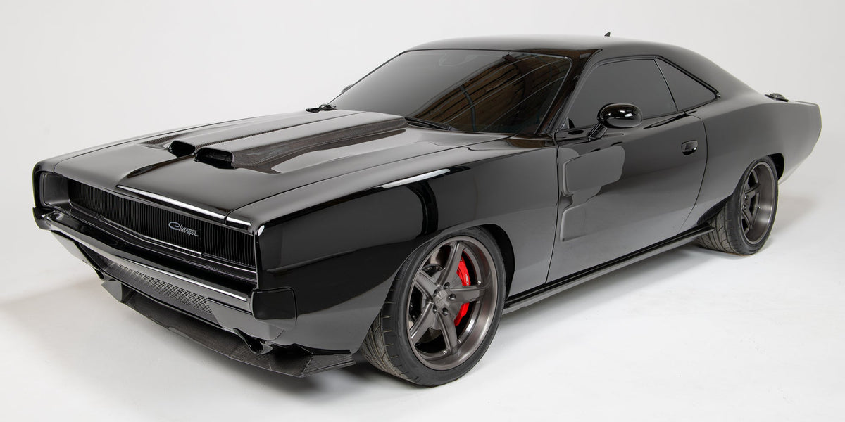 An all black carbon fiber C68 Dodge Charger against a white background