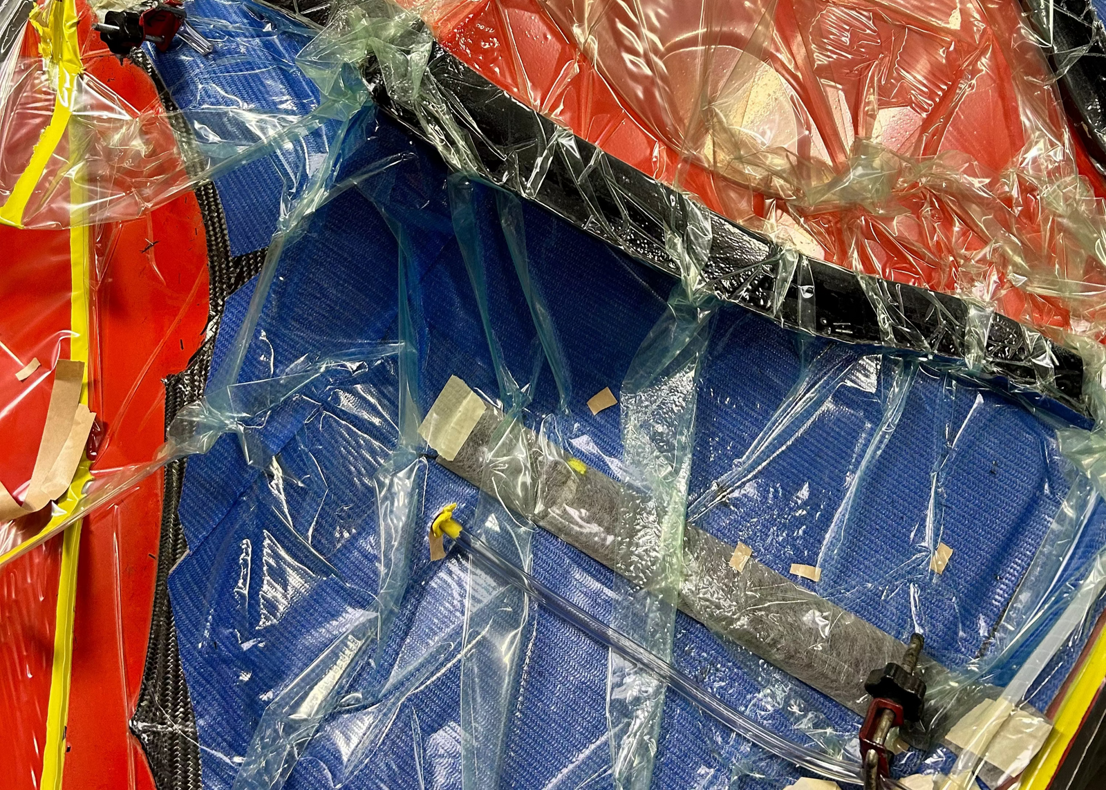 A closeup of a carbon fiber layup before infusion.