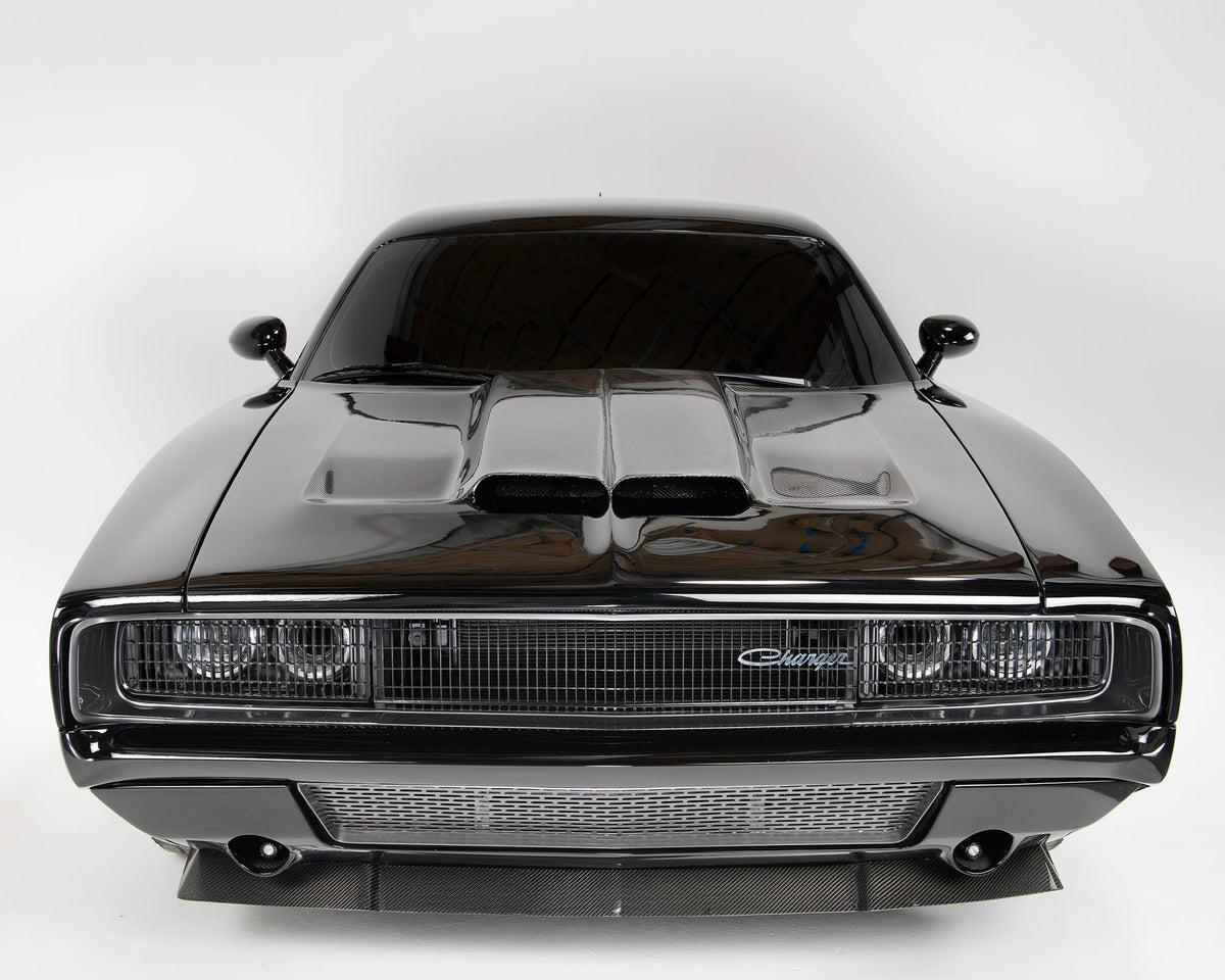 an all black carbon fiber dodge charger front angle