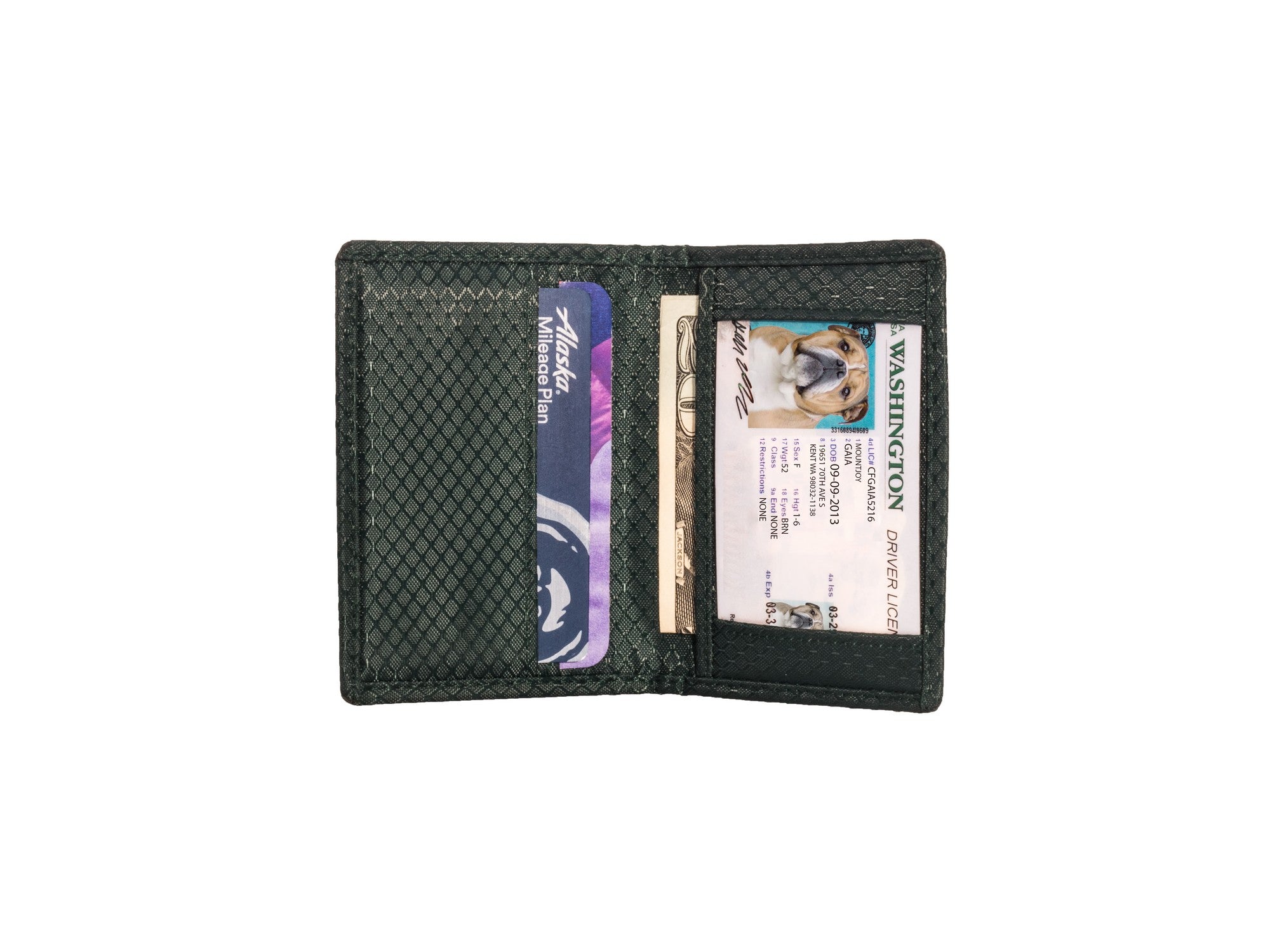 Green ripstop nylon interior with a few card slots including I.D slot