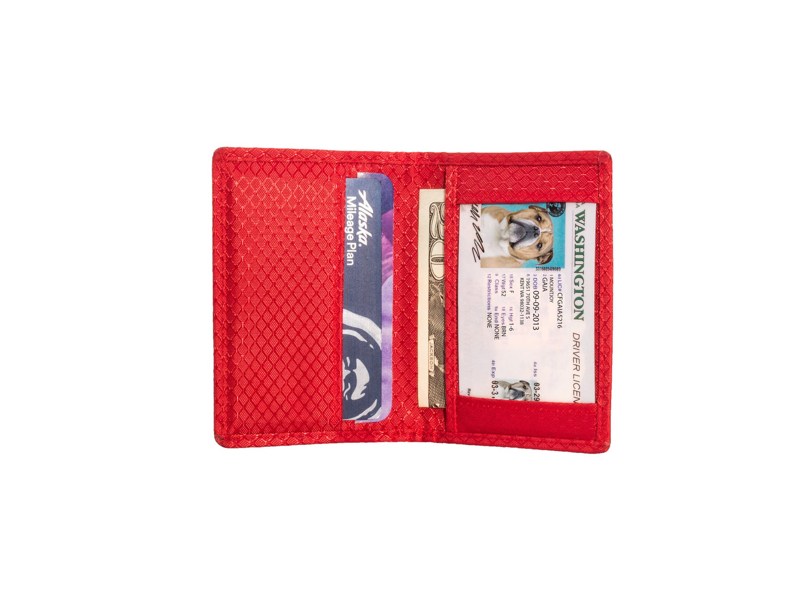 Red ripstop nylon interior with a few card slots including I.D slot